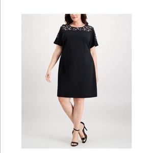 Embroidery detailed black dress